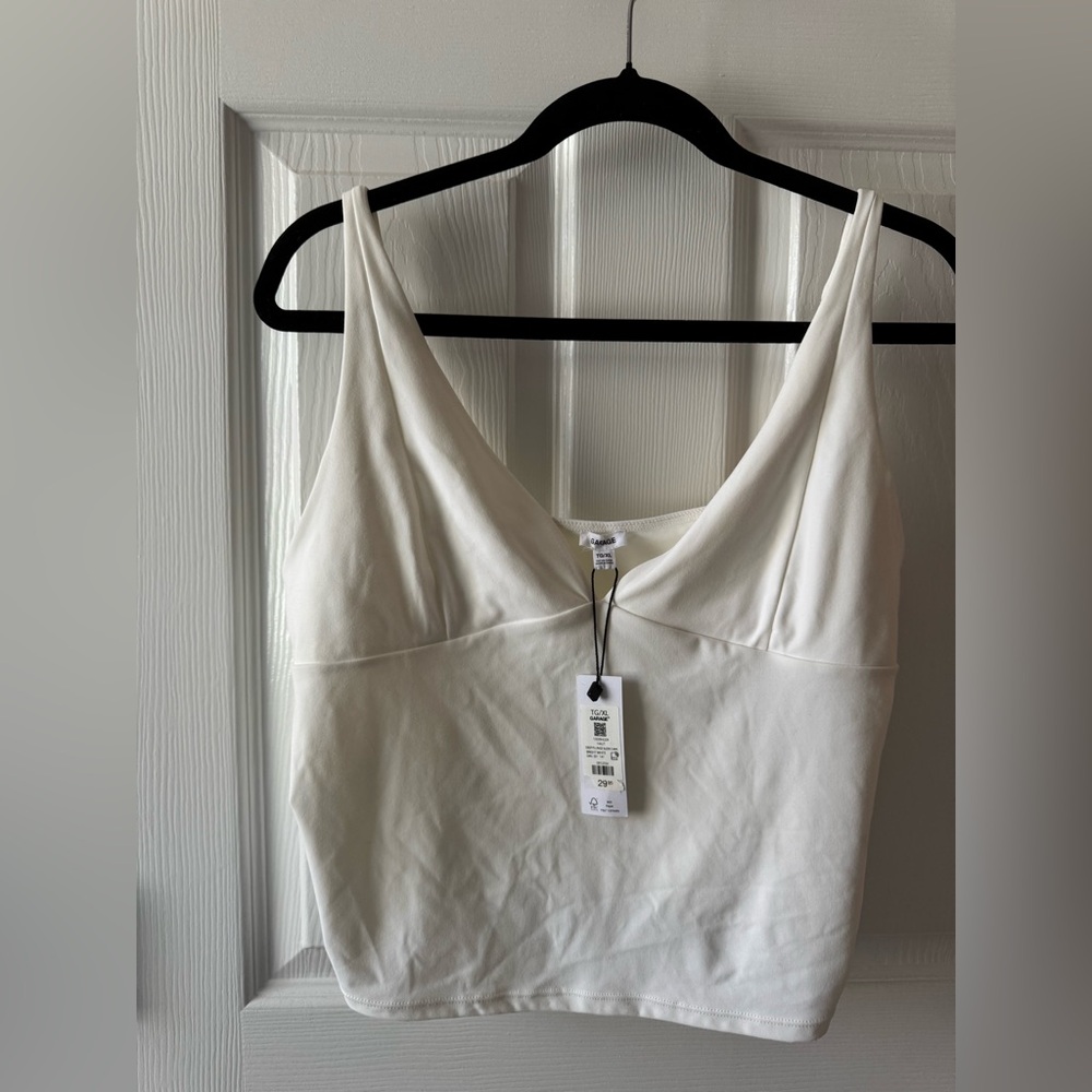 Garage Deep Plunge Sleek Cami Top
XL 
Excellent Condition(Brand-New with Tags)